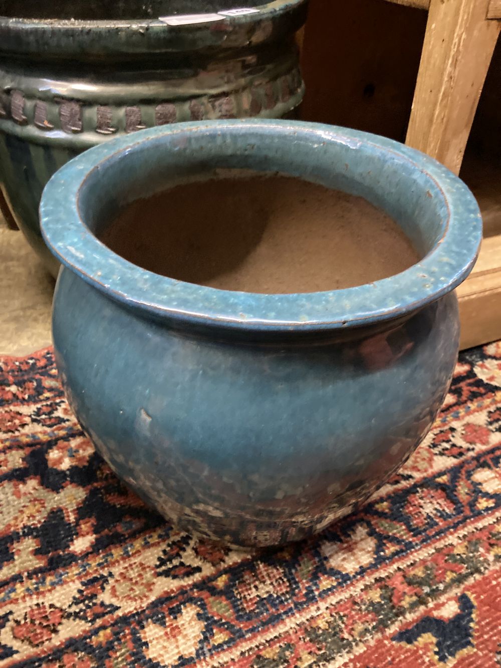 Two glazed earthenware garden planters, largest diameter 37cm